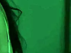 a milf lesbian interacts with a young blonde teen in a tattooed video