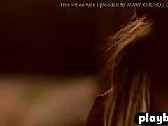 Brunette babe rips clothes to reveal naked tits in solo undressing.