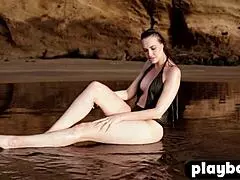 Big round ass mature woman named Jasmin poses completely naked, exposing her perfect body outdoors