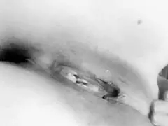 this busty milf is caressing her big tits at home