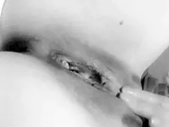 this busty milf is caressing her big tits at home