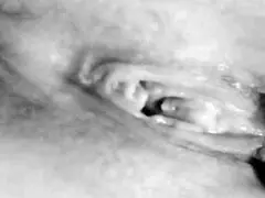 this busty milf is caressing her big tits at home