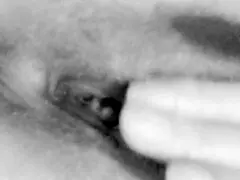 this busty milf is caressing her big tits at home