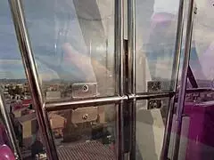 thrilling blowjob on the ferris wheel contrasts with the cute milf's innocent look