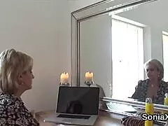 cheating uk mature lady sonia spreads her big hooters in lingerie