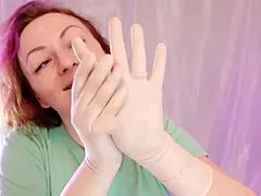 Arya Grander creates ASMR with surgical gloves
