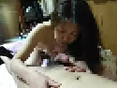 This Japanese milf is licking nipples and dick in her blowjob video