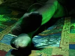 Perfect toes peek through sexy fishnets on a milf housewife