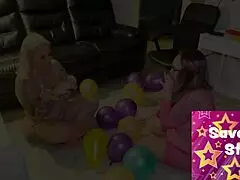 blonde nerd milf in fishnets plays with dildos and balloons in lesbian fun