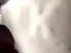 ebony housewife with a seriously wet beaver on the bed