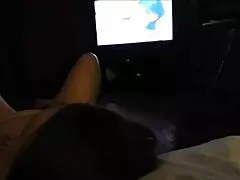 Cute milf fingering her hot pussy while watching porn