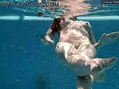 Check out Nicole, the skinny Russian milf with perfect ass and pointy nipples in bikini, smoking seductively.