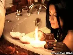 Arab brunette babe teases her lover with softcore music.