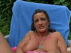 Busty German milf plays with herself outdoors in hot solo