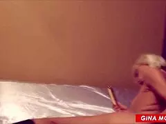 Blonde MILF slut squirts loudly in high boots.