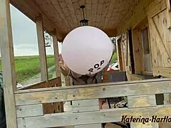 blowing balloon to very high size with big boom at the end