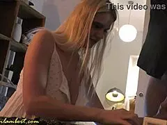 A cute blonde wife with big natural boobs teases in a downblouse while husband is away.