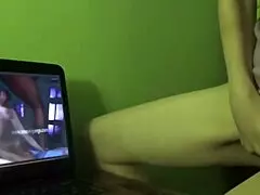 Redhead milf reaches orgasm from dry humping while watching homemade porn.
