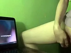 Redhead milf reaches orgasm from dry humping while watching homemade porn.