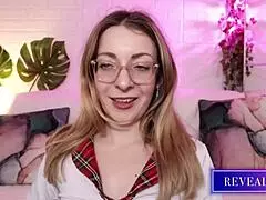 Sensual milf on Revealme sucks dildo in steamy solo show