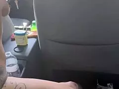 Streetwalker watches the camera scene unfold.