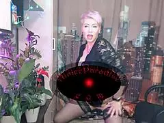 Purple-haired mature slut with big tits goes wild on webcam