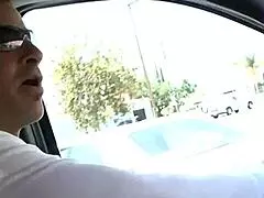 Blonde mom with big tits rests on the bed.