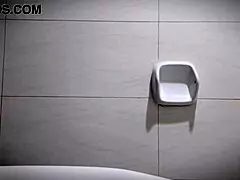 Pretty office girl relaxes in the bathroom with close-up views