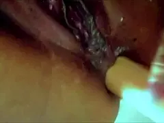 this single brunette milf aggressively shoves a sex toy into her anal hole for solo masturbation at home