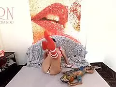 Girl strips naked with big toy intensely