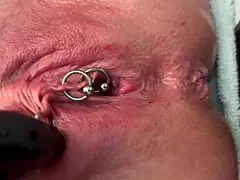 Rub that pierced clit hard!