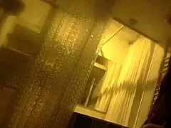 bent over brunette in shower