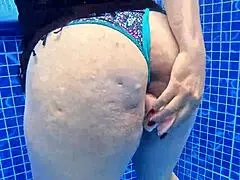 Woman surprised masturbating in pool water