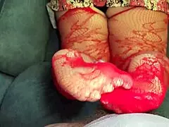 BBW MILF gives footjob in sexy lingerie