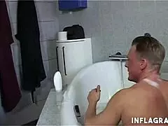 Tattooed milf fucks in shower passionately