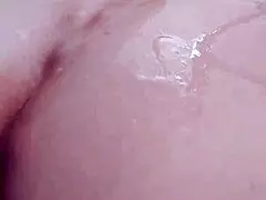 The mature woman's features are prominently displayed in this homemade video