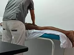 the doctor gives special attention and sensual massage to his female patient