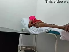 the doctor gives special attention and sensual massage to his female patient