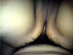 a couple's first intimate experience, overcoming initial discomfort and enjoying it