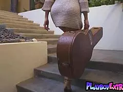 classy big boobed milf stripping on guitar...