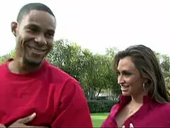 Claudia Valentine caught in a wild interracial cougar hunt, bent over for deepthroat action.