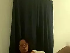 Mature Latina Teases with Striptease Wearing Sexy Glasses