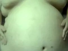 big belly gets fucked while husband rubs and cums on it