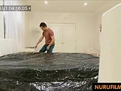 wow, this busty asian milf gives an amazing nuru massage with handjob!