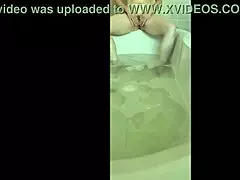 Horny bride masturbates to orgasm in solo bath