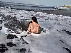 stepmom flashes big tits at nude beach photoshoot with stepson