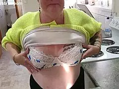 Kiwi milf sub cleans up wine spilled by her master in a fetish scene