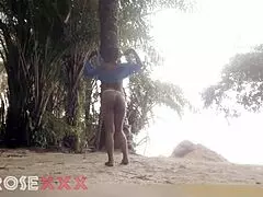 yo, this black girl’s teasing hard on the beach, so hot!