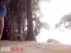 yo, this black girl’s teasing hard on the beach, so hot!