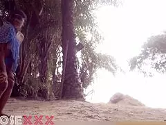 yo, this black girl’s teasing hard on the beach, so hot!